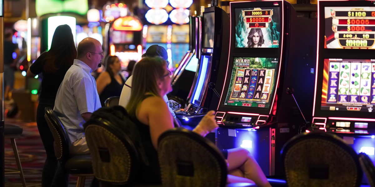 People in the casino playing slots image