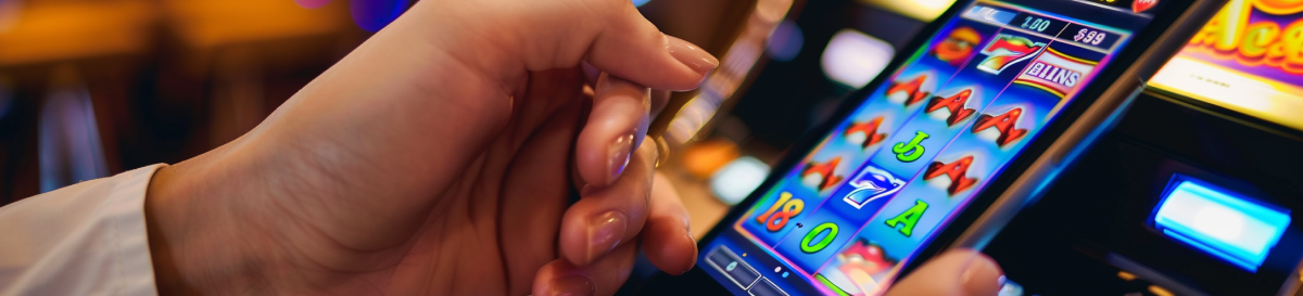 A person playing mobile slots image