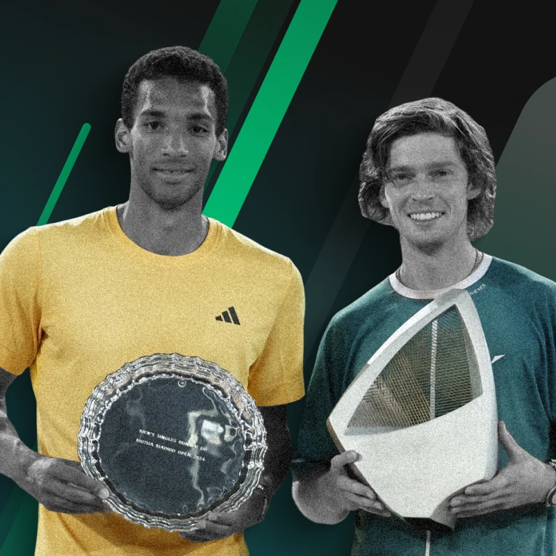 Rublev holding the trorphy with Auger-Aliassime image