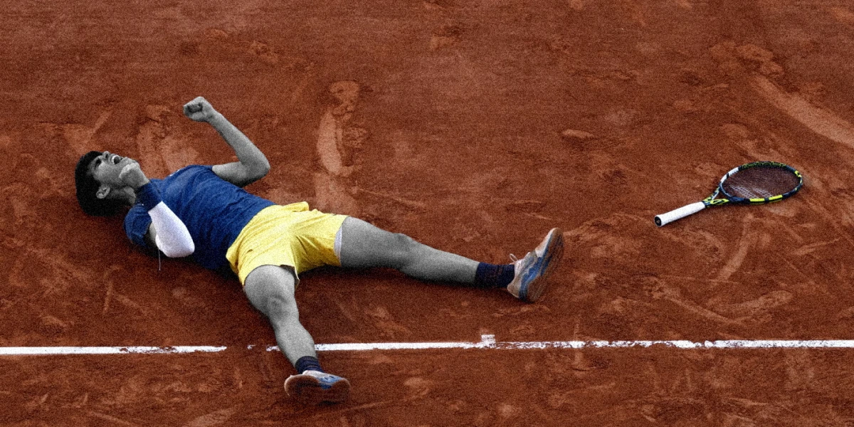 Alcaraz lays on the court after defeating Zverev in the final image